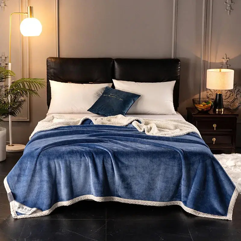 Royal blue double-layer velvet sofa blanket with soft plush texture and white faux fur trim for bedroom throw use