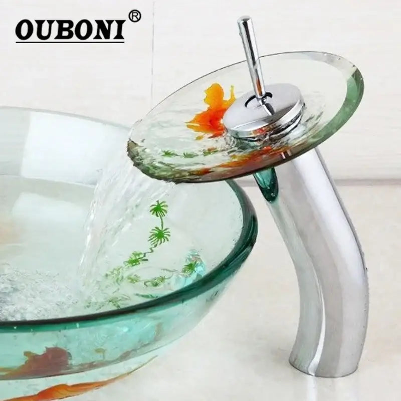 Ouboni glass waterfall faucet with chrome finish and curved spout featuring oval transparent glass plate decorbites goldfish glass