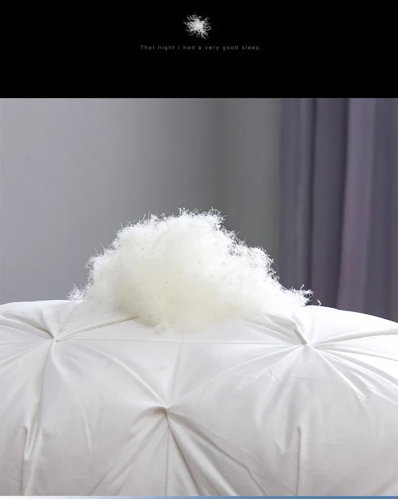 White fluffy goose down soft duvet with a tuft of down material on top for luxury warmth and comfort