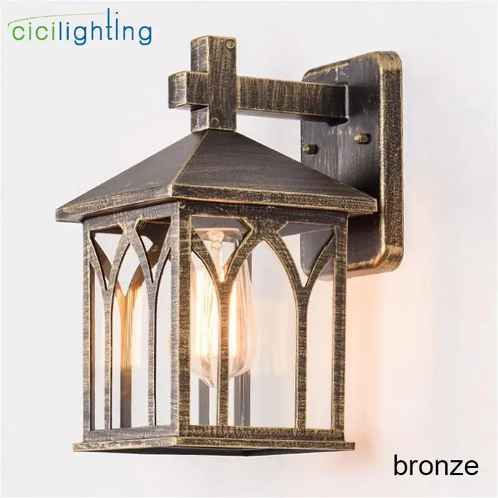Bronze-finished gothic arched glass led wall lamp with visible filament bulb for garden courtyard lighting