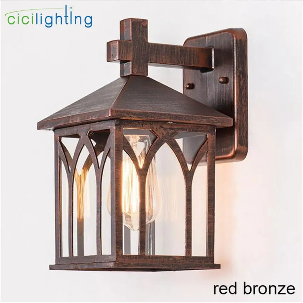Red bronze gothic arched glass led wall lamp with cross topped roof for garden courtyard lighting