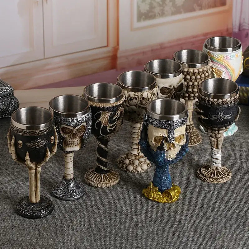 Gothic dragon skull goblet set with metallic interior featuring black silver beige blue and gold skull goblet decorbites dragon skull motifs