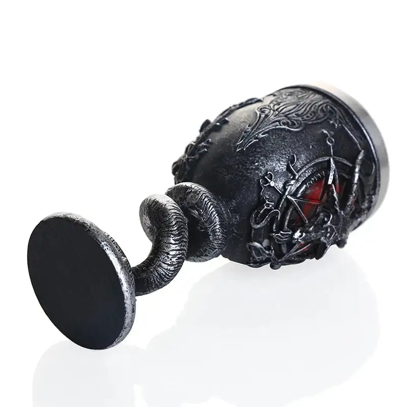 Black ornate gothic silver baphomet stainless steel wine glass with intricate metalwork and red gemstone centerpiece