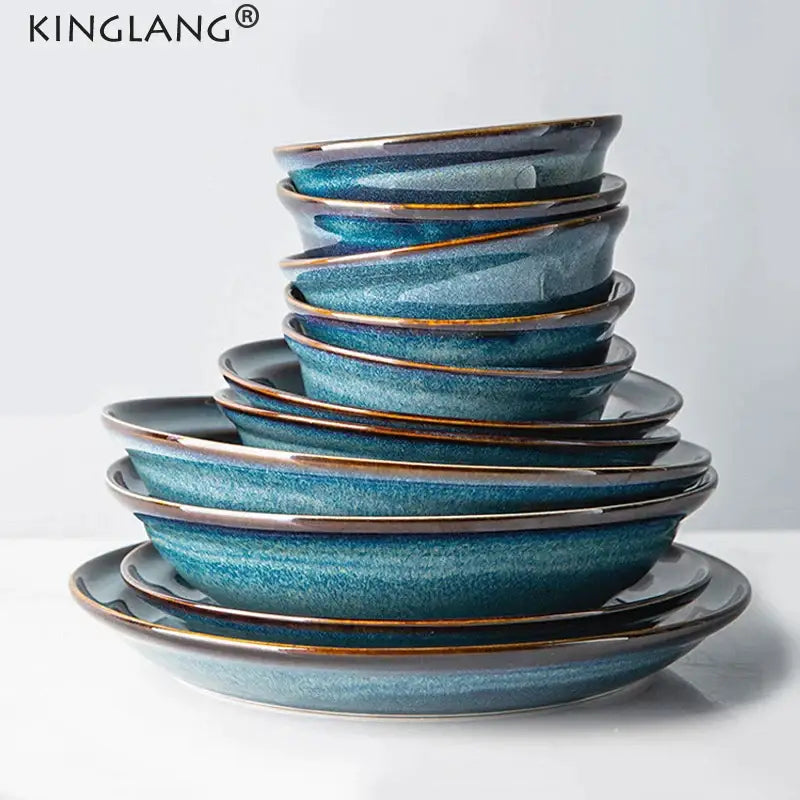 Stacked set of beautiful blue ceramic bowls with gradient glaze and gold rim dinnerware dish for dining room use