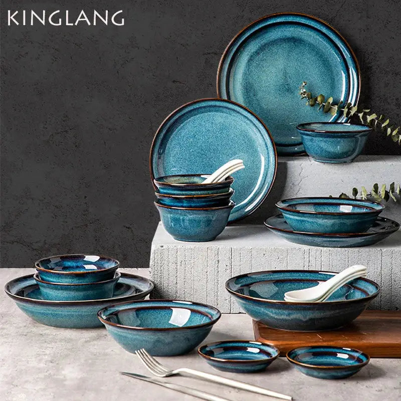 Beautiful blue ceramic bowl and dinnerware dish with rustic glazed finish and gold rim for elegant dining room use