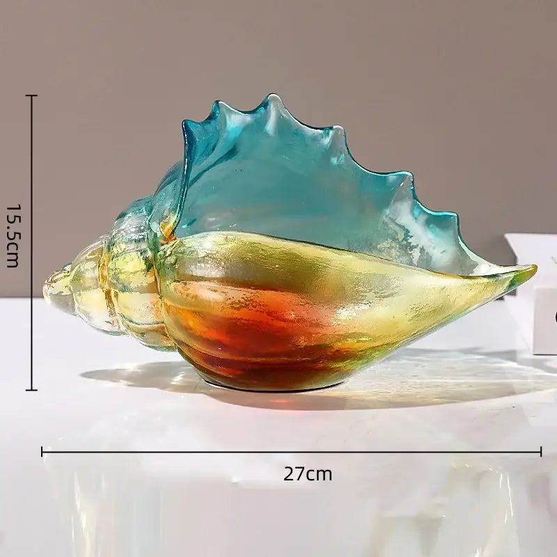 A vibrant translucent gradient conch glass key tray in blue yellow and orange hues for decorbites conch glass handicrafts