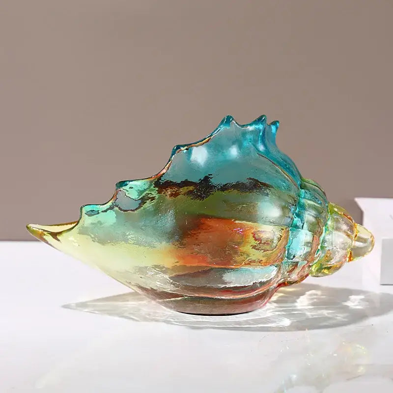 Translucent iridescent decorbites conch glass key tray with swirling teal amber and gold hues for living room decor