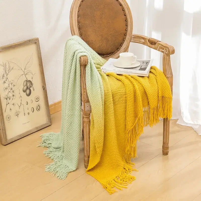 Cozy knit blanket in mint green and mustard yellow with textured weave and fringed edges from decorbites gradient pineapple grid collection