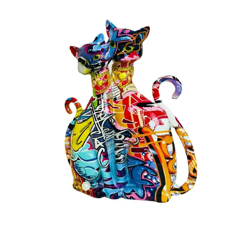 Vibrant graffiti-style decorbites cat couple sculpture with bold colorful patterns and metallic accents for living room decor
