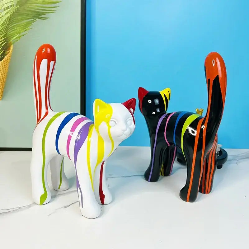 Glossy black and white ceramic graffiti cat desk storage statue with rainbow drip paint accents for living room decor