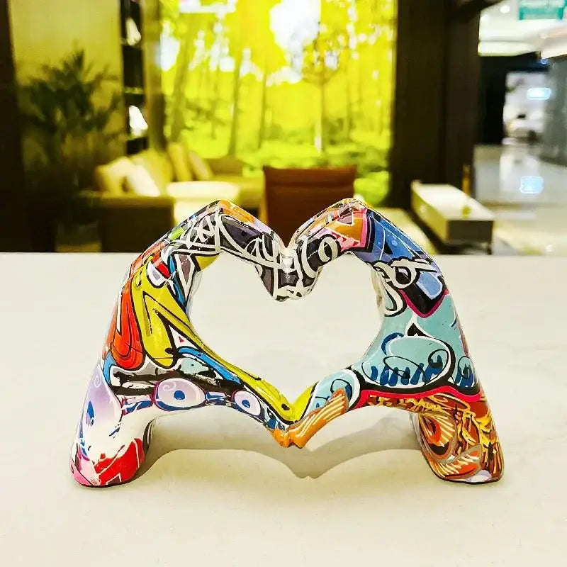 A vibrant heart-shaped resin ornament with colorful love graffiti patterns for office desktop decorbites colorful love