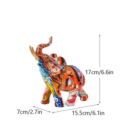 Vibrant abstractly painted orange blue and yellow graffiti elephant resin figurine by decorbites for living room decor