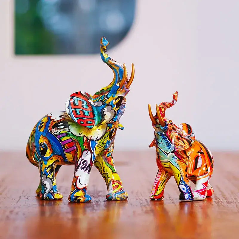 Vibrant graffiti elephant resin figurine by decorbites with bold colors and intricate designs for living room decor