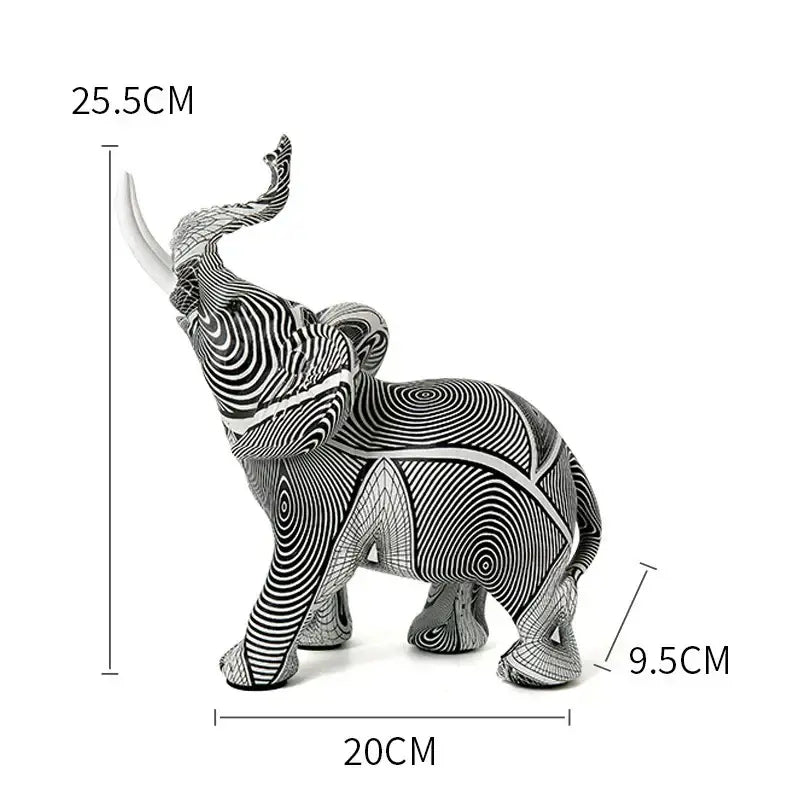 A sleek black and white graffiti resin elephant sculpture with swirling geometric patterns by decorbites for living room decor