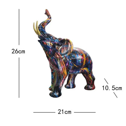 A vibrant graffiti resin elephant sculpture with golden tusks and glossy finish for living room decorbites elephant decor