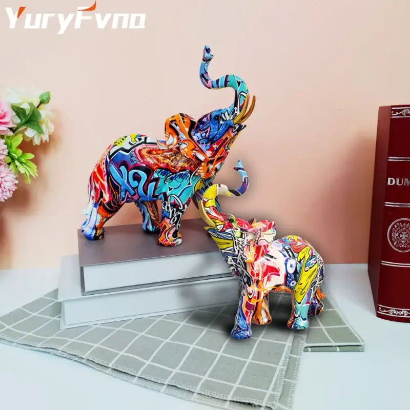 Vibrant graffiti resin elephant sculpture by decorbites featuring bold colors and intricate designs for living room decor