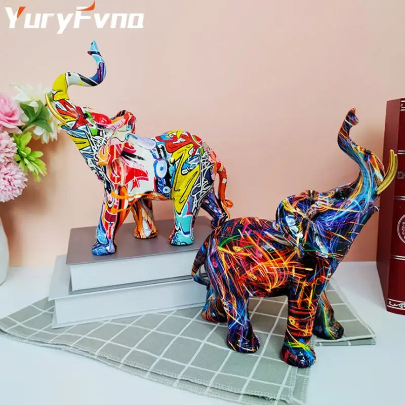 Vibrant graffiti resin elephant sculpture with bold neon rainbow colors decorbites elephant sculpture for living room decor
