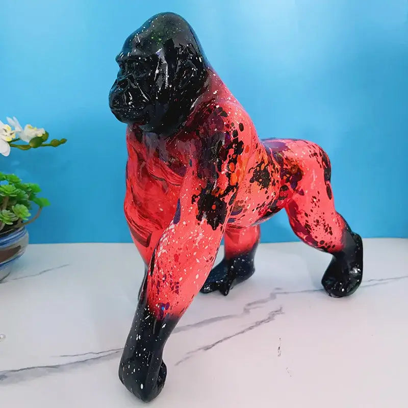Glossy red graffiti street art gorilla sculpture with black white splatters resin decorbites gorilla sculpture for living room decor