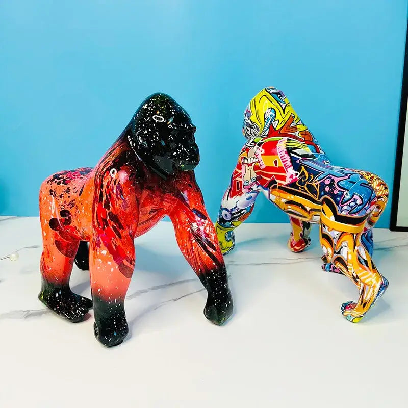 Vibrant graffiti street art gorilla sculpture with glossy resin finish and bold color gradients for living room decor by decorbites