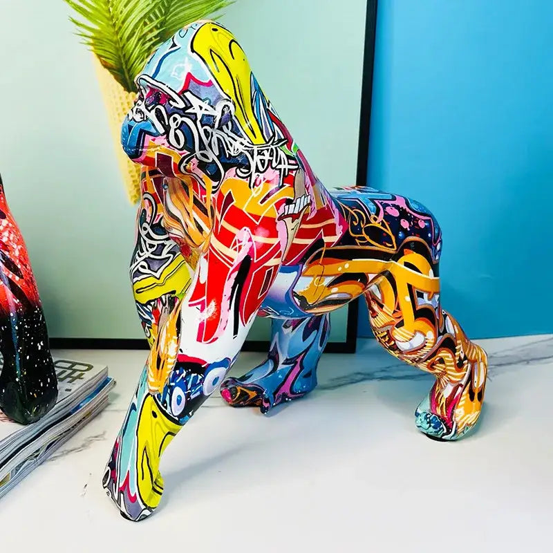 Vibrant resin decorbites gorilla sculpture with bold yellow red blue and pink graffiti street art for living room decor