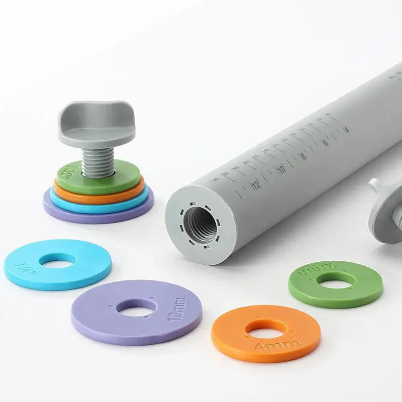 Gray adjustable silicone rolling pin with colorful blue purple green and orange rings by decorbites kitchen tool