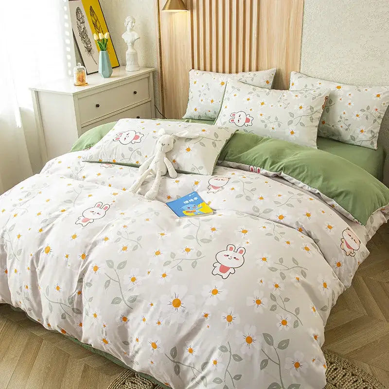 White duvet cover with playful cartoon bunnies yellow flowers and green leaf print for gray and mustard bedding set