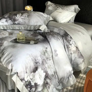 Gray and white floral patterned satin bedding set with ruffled edges featuring decorbites flowers pattern brushed design