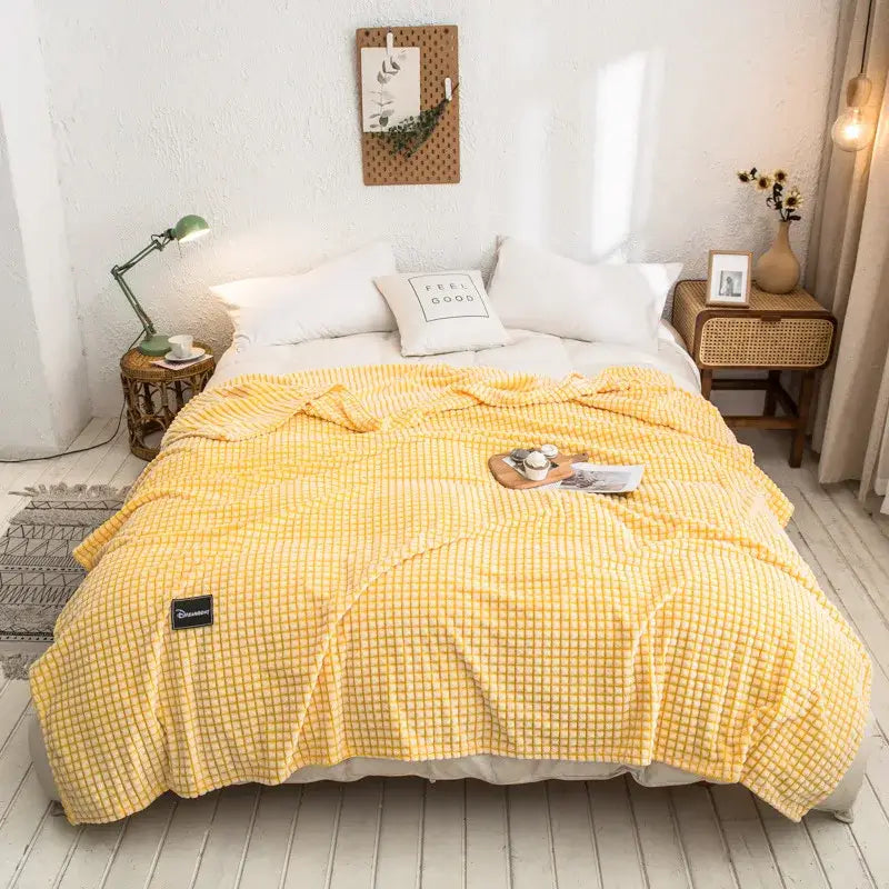 Yellow checkered fleece blanket detail of gray and yellow plaid coral fleece bed blanket for bedroom use