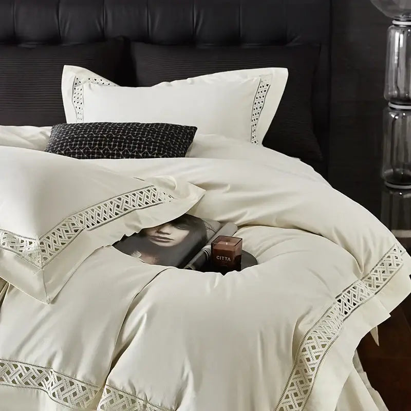 Cream-colored satin duvet set with intricate white lace trim for stylish egyptian cotton hotel bedding set use