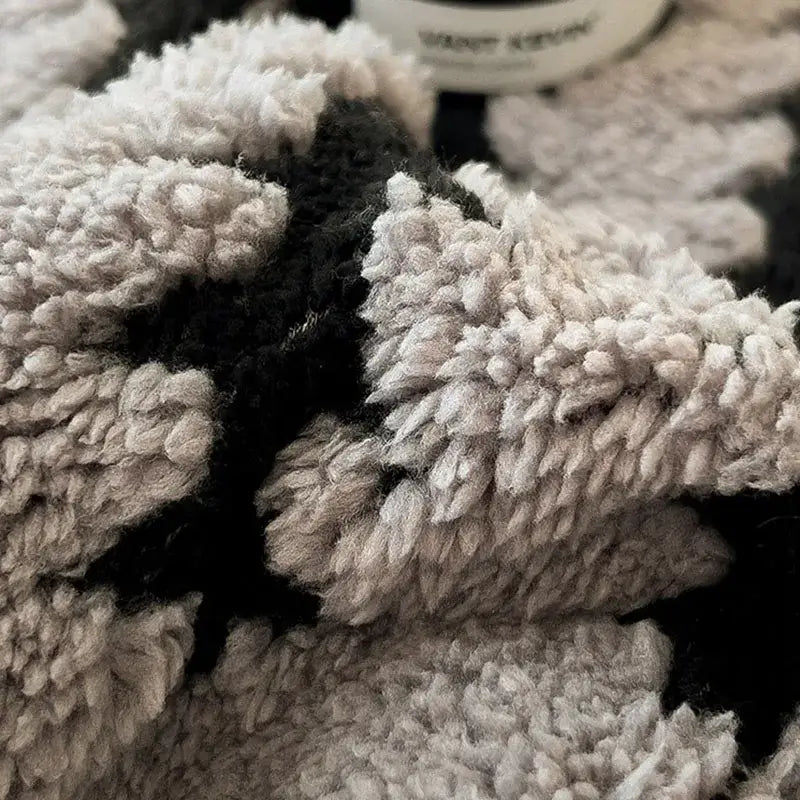 Gray and black decorbites jacquard blanket with thick lamb wool and soft textured surface for living room use