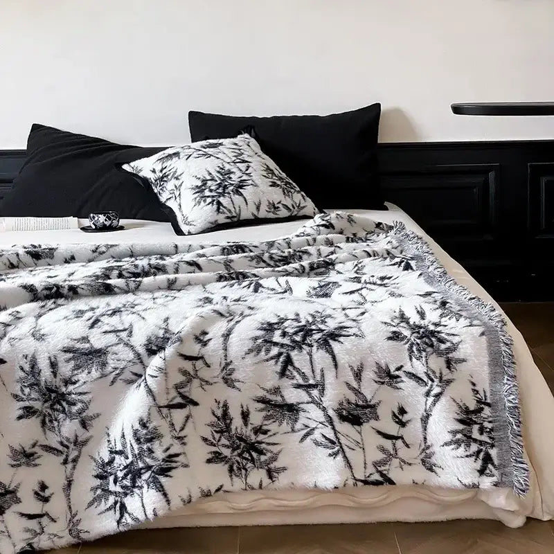Gray butterfly jacquard imitation mink fur blanket white plush throw with black bamboo leaf pattern and fringed edges