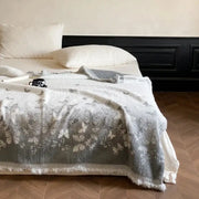 Soft gray bedroom throw blanket with butterfly jacquard imitation mink fur and frayed edges by decorbites