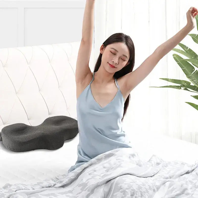 Dark gray memory foam butterfly memory foam cervical support pillow with contoured shape for ergonomic bedroom use