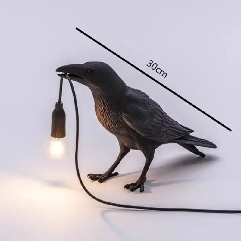 Black ceramic lively bird resin table lamp with glossy textured finish and detailed feathering for bedroom decorbites lively bird