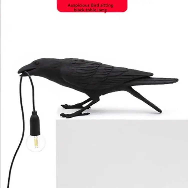 Black ceramic crow table lamp with exposed bulb cord held in beak fits decorbites lively bird resin bedroom decor