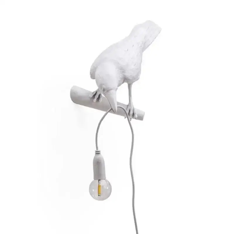 Gray ceramic lively bird resin table lamp featuring a white ceramic bird wall lamp with exposed bulb decorbites lively bird design