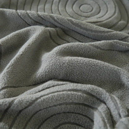 Gray circular textured polar fleece sofa cover with embossed pattern for modular sofas and accent chairs living room use