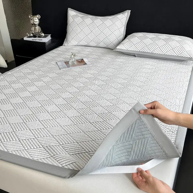 Gray cooling ice bean mesh quilted mattress pad with subtle geometric pattern and soft textured surface for decorbites cooling ice