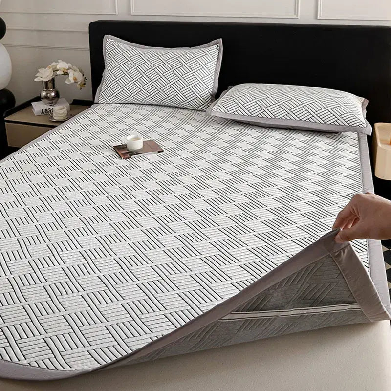 White and gray geometric-patterned cooling ice bean mesh quilted mattress pad with soft textured surface by decorbites cooling ice