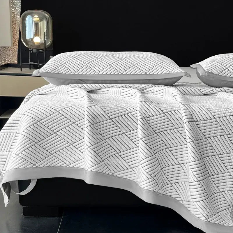 White quilted bedspread with geometric pattern and satin trim for decorbites cooling ice bean mesh mattress pad