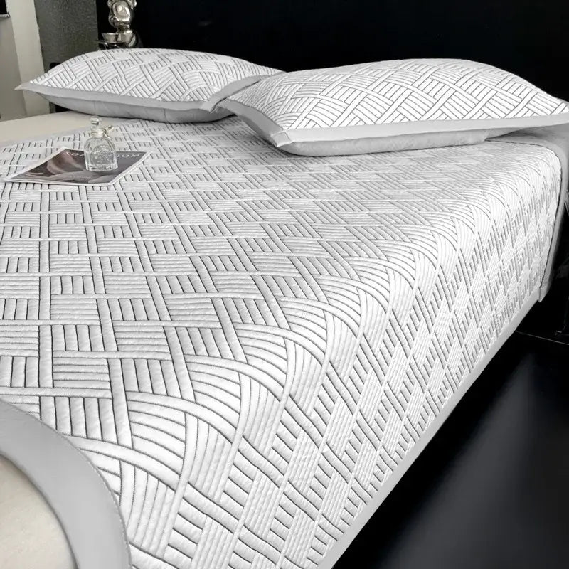 White quilted cooling ice bean mesh mattress pad with geometric lattice pattern and subtle gray stitching by decorbites cooling ice