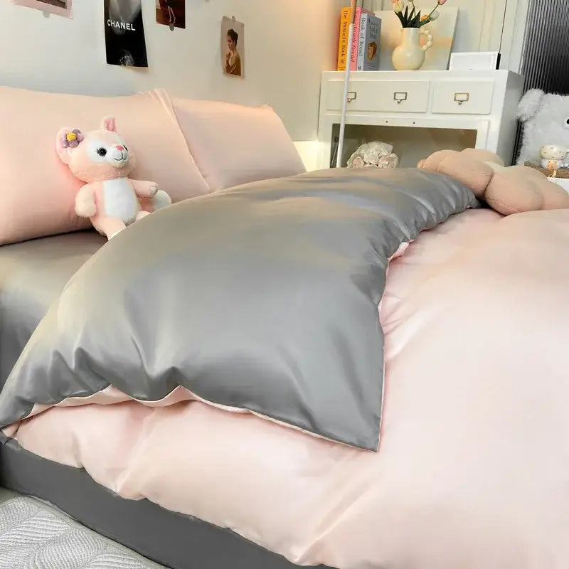 Gray double color blocked ice silk bedding set with soft satin-like gray duvet cover and pink inner lining