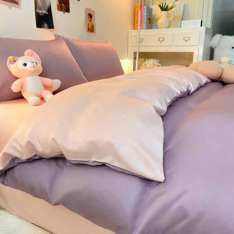 Soft lavender satin duvet cover set with matching pillowcase featuring smooth glossy finish for double color blocked ice silk bedding set