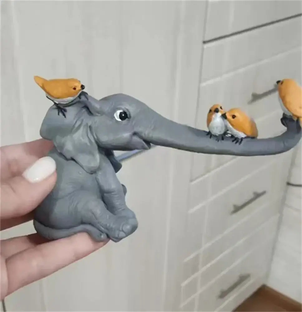 Gray ceramic elephant bird rabbit figurines with three small orange birds perched for living room decorbites elephant bird