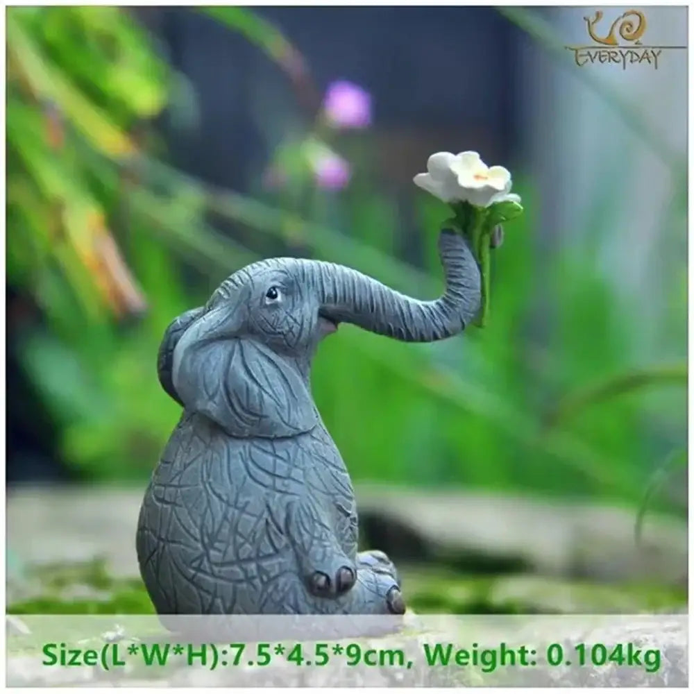 Gray ceramic elephant bird rabbit figurine holding a white flower in its trunk resin decor for living room