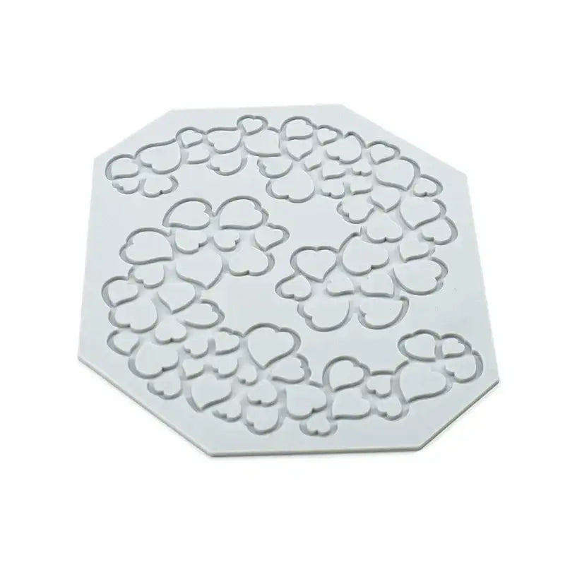 White octagonal silicone mold with intricate raised heart leaf pattern from gray floral and decorbites heart leaf set