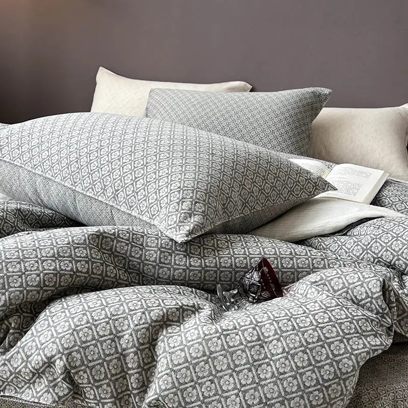 Gray and white geometric patterned bedding set with subtle floral motif in decorbites linen cotton jacquard for bedroom decor