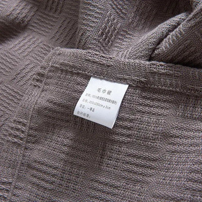 Gray herringbone cotton waffle towel quilt featuring a textured woven cotton waffle decorbites cotton waffle pattern