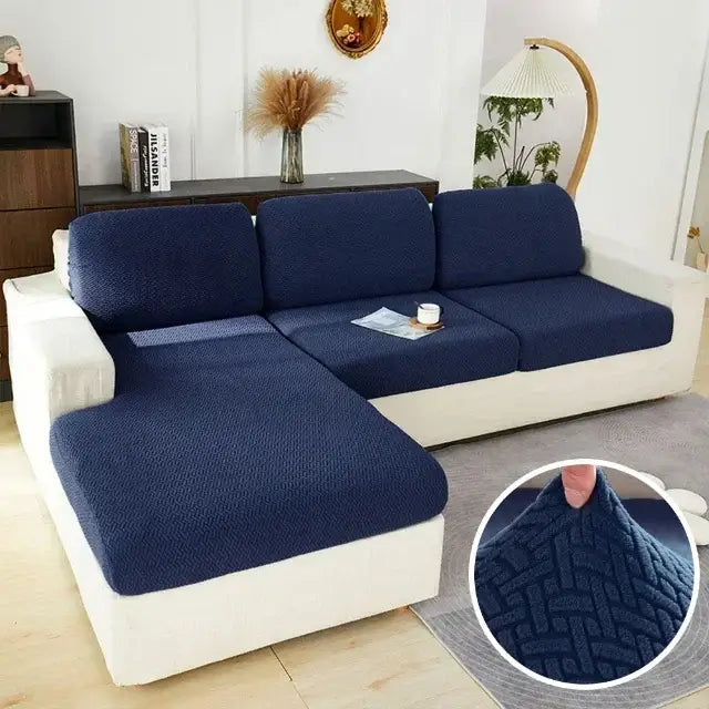 Navy blue textured fabric sofa cover designed as a stretch seat protector for living room furniture