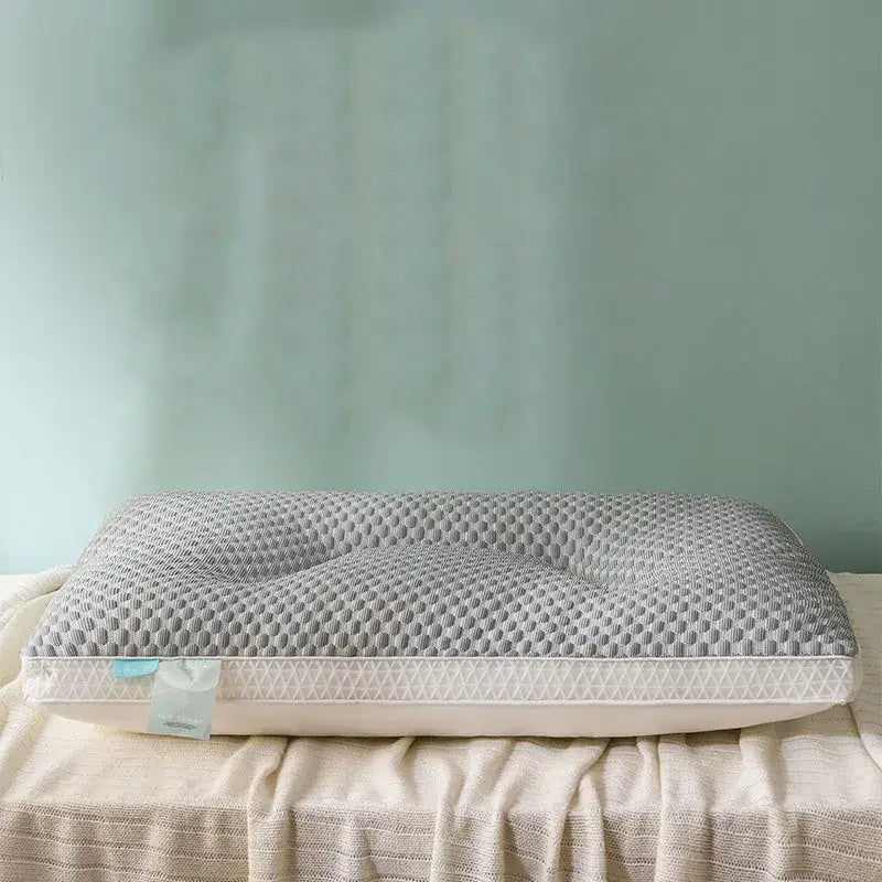 Gray ice rayon cooling pillow with honeycomb-textured memory foam and white stitched border for cervical neck support